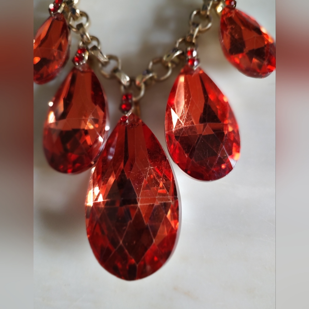 An Orange Crystal And Gold Necklace